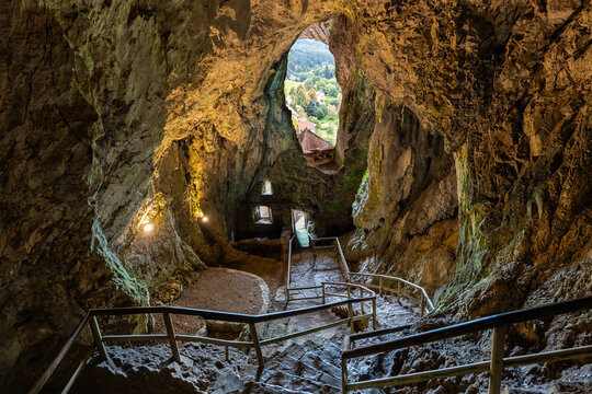 Interior of the cave carved into the rock of Predjama Castle overlooking the outside, Slovenia.