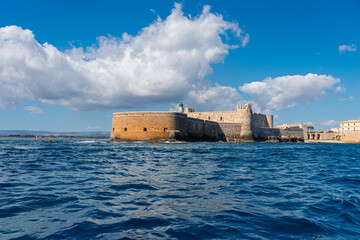 Castello Maniace fortress in Syracuse, Sicily, seen from the Mediterranean Sea