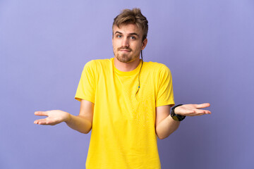 Young handsome blonde man isolated on purple background having doubts