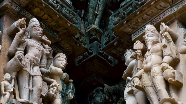 Erotic sculptures at the Parshvanatha temple, within the Khajuraho Group of Monuments in the Chhatarpur district, Madhya Pradesh, India, Asia
