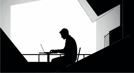 Silhouette of a focused person working on a laptop in a modern, minimalist setting.
