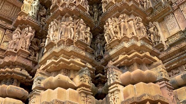 Erotic sculptures at the Parshvanatha temple, within the Khajuraho Group of Monuments in the Chhatarpur district, Madhya Pradesh, India, Asia