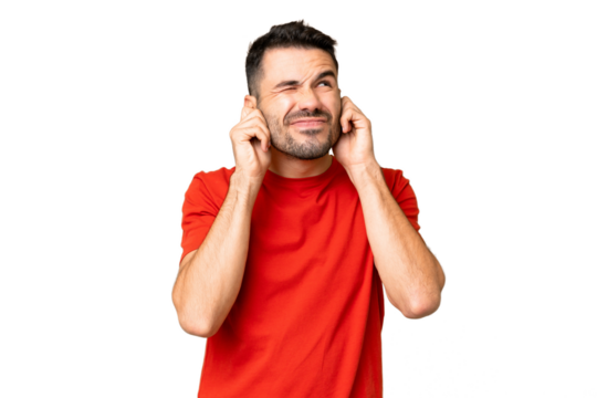 Young handsome caucasian man over isolated chroma key background frustrated and covering ears