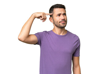 Young handsome caucasian man over isolated background making the gesture of madness putting finger...