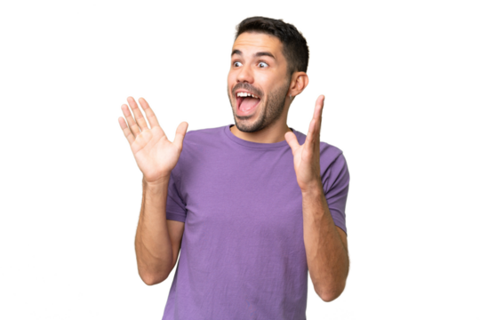 Young handsome caucasian man over isolated background with surprise facial expression