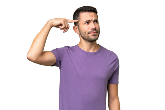 Young handsome caucasian man over isolated background making the gesture of madness putting finger on the head