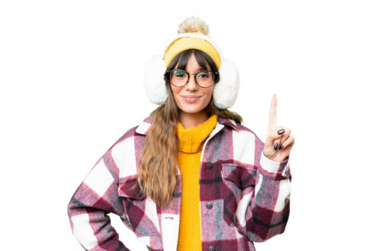 Young caucasian woman wearing winter muffs over isolated chroma key background showing and lifting a finger in sign of the best