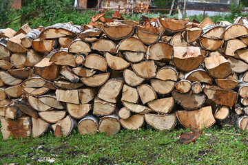 Rural landscape with a woodpile