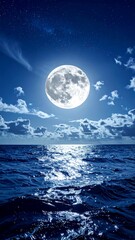Fototapeta premium Night scene depicts a bright full moon over the dark blue ocean