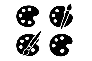 Various paint palettes and brushes ready for an art session in a creative studio setting