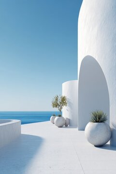 White architectural terrace overlooking tranquil ocean