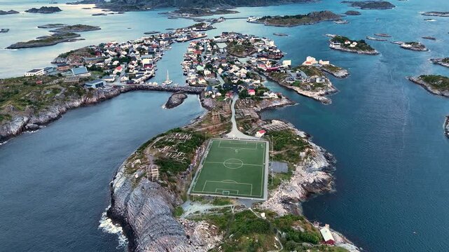 Discover the breathtaking Henningsvaer Football Stadium nestled among the scenic islands of Lofoten.
