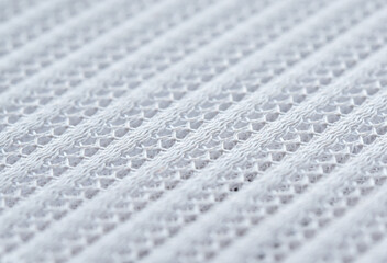 Close-up sample fabric. White mesh texture. Soft and breathable used for industrial work.