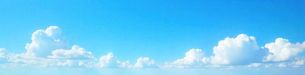 Serene Azure Sky Fluffy White Clouds Drifting Across a Vast Blue Horizon, Perfect for Peaceful and Tranquil Backgrounds in Travel and Nature Photography