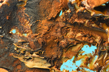 melted chocolate in cocoa powder, spread, sweets abstract close-up.