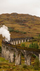Naklejka premium The Jacobite Steam Train crossing the Glenfinnan Viaduct