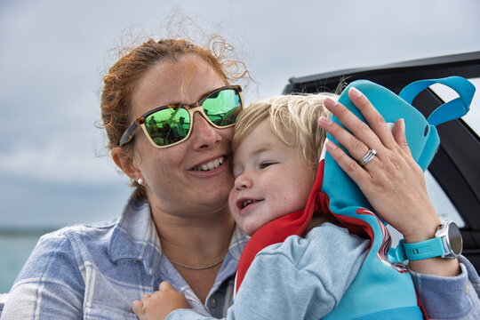 Happy mother and child hugging