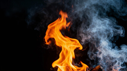 Bright orange flames and rising smoke against a dark background