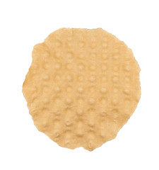 Un morceau de carton brut rond et déchiré sur un fond transparent.