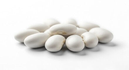 Pile of white beans isolated on white background, close up studio shot