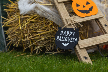 Warm autumn Halloween setup with Pumpkins and Spooky Decorations. Happy Halloween!