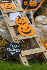 Warm autumn Halloween setup with Pumpkins and Spooky Decorations. Happy Halloween!