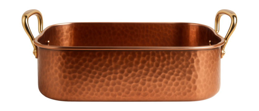 A hammered copper roasting pan, perfect for roasting root vegetables in a rustic kitchen.