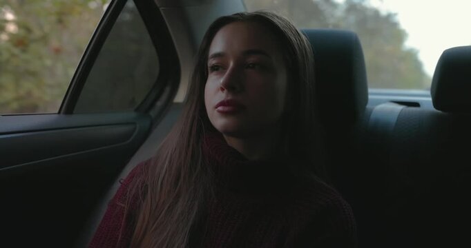 A woman passenger smoking electronic cigarette with relax and comfort