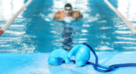 Individual earplugs designed for swimming keep ears safe while enhancing sound control in swim pool...