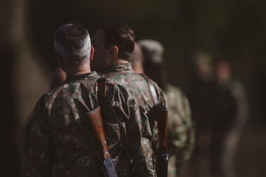 Romanian reservists take part at a drill where they train to shoot weapons