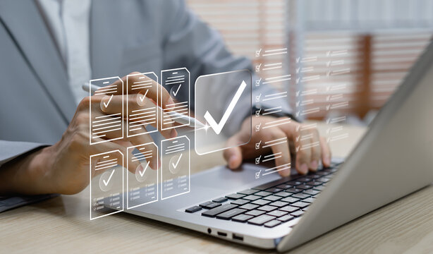 Online document validation and quality assessment management, businessman reviewing checklist for business document evaluation, consulting, and market data report analysis.