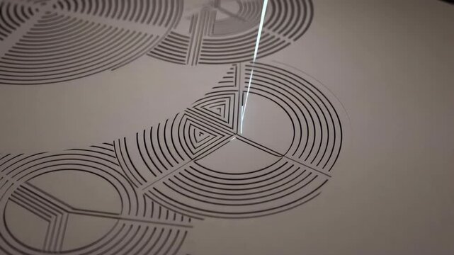 Laser cutter engraving complex geometric circle pattern