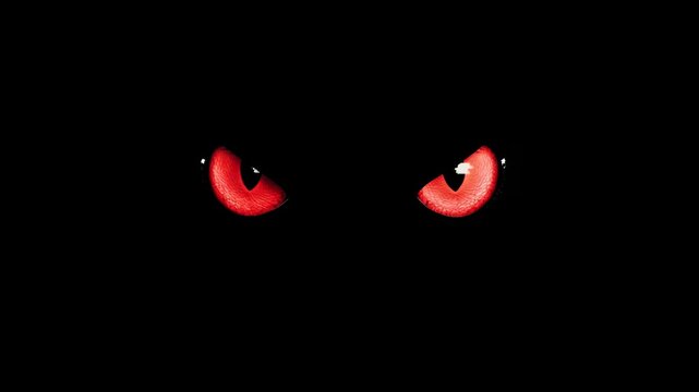 Red evil monster eyes staring and blinking in the pitch-black darkness