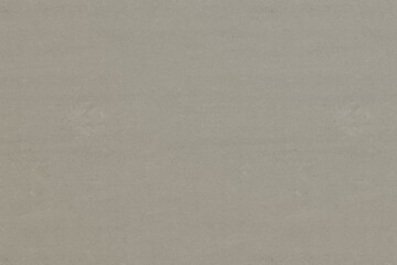 A subtle, light taupe surface features faint horizontal striations and scattered, barely visible, symmetrical textural imperfections, creating a minimalist background