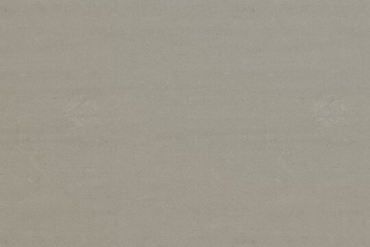A subtle, light taupe surface features faint horizontal striations and scattered, barely visible, symmetrical textural imperfections, creating a minimalist background