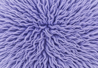 Fototapeta premium Close up of soft lavender shaggy textured surface with long curly fibers creating a fluffy pattern