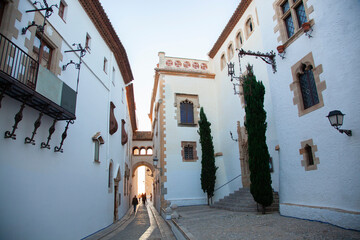 View of a street in a Mediterranean town, Sitges, Catalonia, Spain
