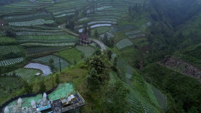 Beautiful Kahyangan tourist place showing green plantation and black castle