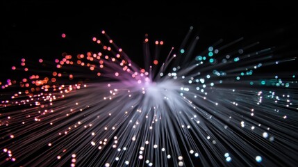 Obraz premium illuminating fiber optic cables diverging in a captivating display of technological prowess