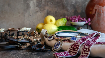 Traditional Accessories with Lemons and Pottery on Rustic Background