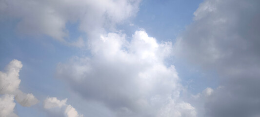 Sky is blue and clear with no clouds. The sky is very bright and the sun is shining. Blue sky with scattered white clouds creating a serene and peaceful atmosphere. Ideal for backgrounds. nature theme