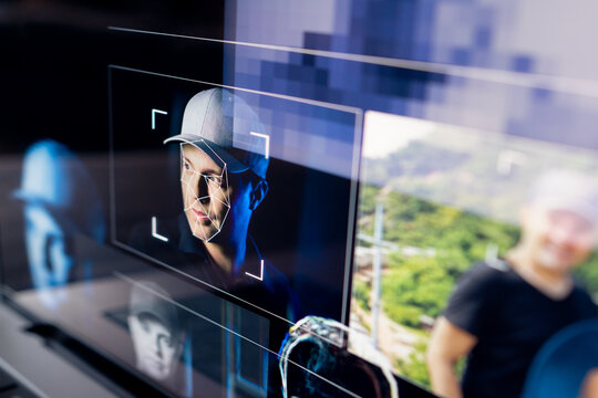 Deepfake with AI. Deep fake fraud. Id data scam or identity theft. Face recognition with artificial intelligence. Impersonate man. Video surveillance technology. Synthetic photo of a human.