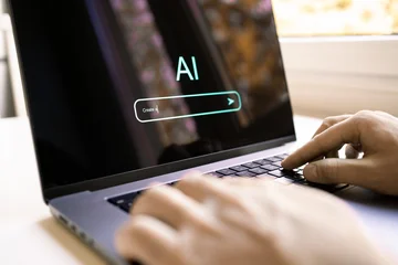 AI prompt to generate content or image with computer. Text model. Artificial intelligence in laptop. Photo generator at creative work. Student searching with virtual chat. © terovesalainen