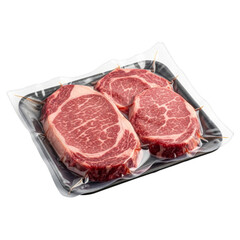 Three vacuum-sealed raw beef steaks isolated on a transparent background