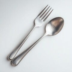 A pair of stainless steel fork and spoon