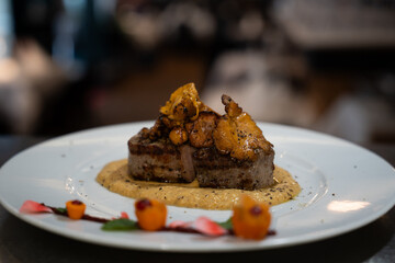 Grilled Beef Steak with Chanterelle Mushrooms on Sauce