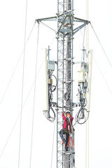 engineer work on communication tower