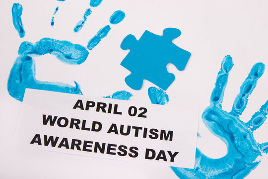 Kid handprint made of paint and inscription April 02 World Autism Awareness Day. Autism Spectrum Disorder