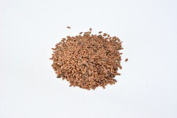 Pile of Brown Flax Seeds on White Background cut out