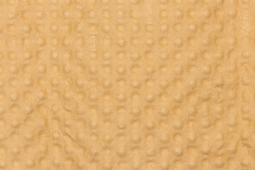 Le fond d'un morceau de carton marron. 